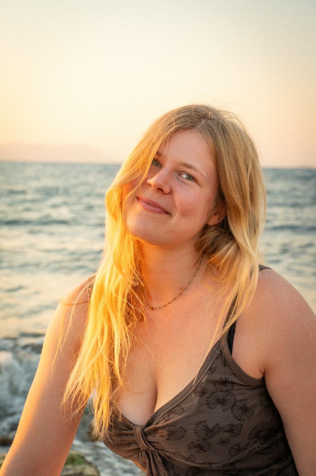 Portrait of a smiling woman with light hair